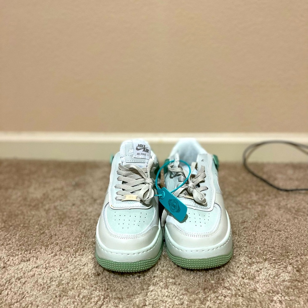 Brand New Nike shoes .5 size to small for me